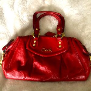 Red leather Coach handbag with shoulder strap